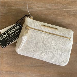 Wristlet with phone charger built in